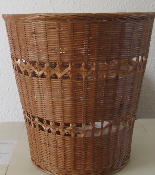 Photo (c) J. G. Betts Brown wickerwork waste paper basket