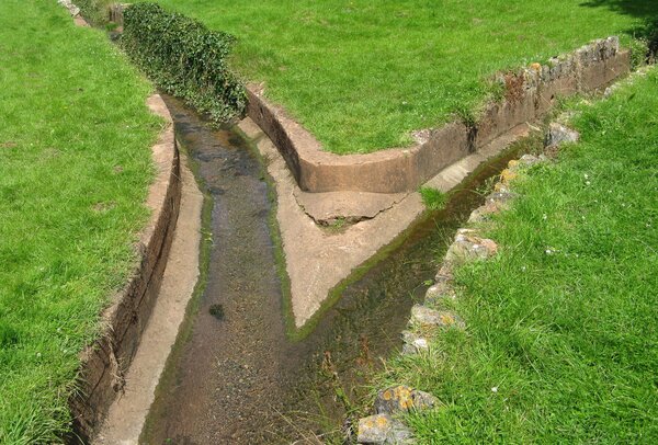 Channels of Fleet brook Torquay converging rom left and right