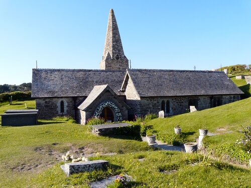 istant view of St Enodoc's church Cornwall with small spire