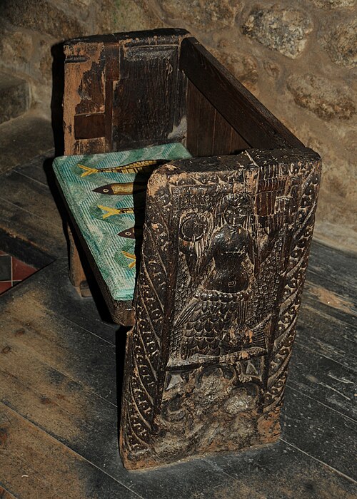Carved mermaid on bench end Zennor Cornwall