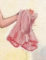 Arm holding voluminous knickers